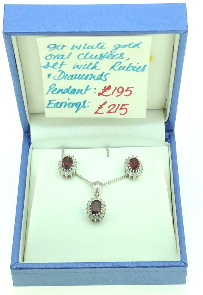 9 ct White Gold Oval Cluster cut Rubies and diamonds necklace and earrings