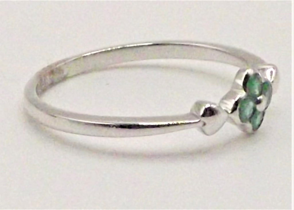 9 ct White Gold flower design ring with Emeralds