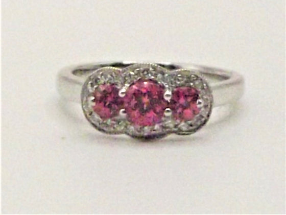 Platinum ring set with pink Spinels & Diamonds