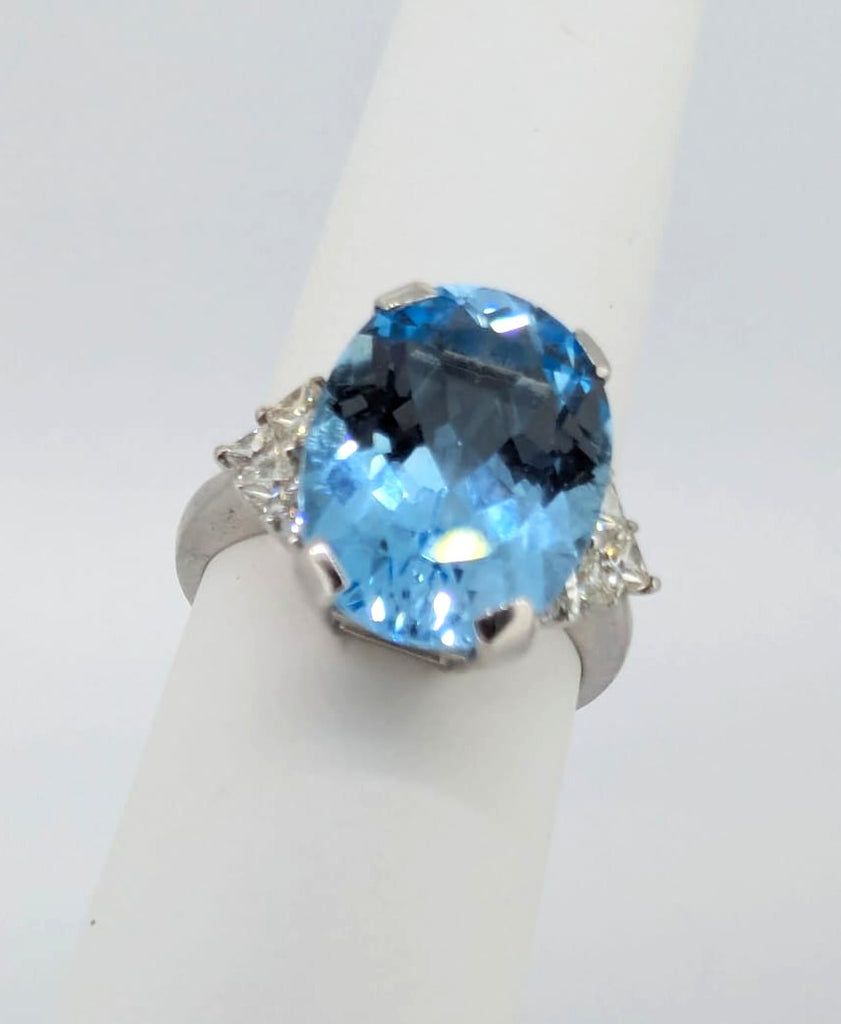 18ct White Gold ring set with single Blue Topaz and Diamonds
