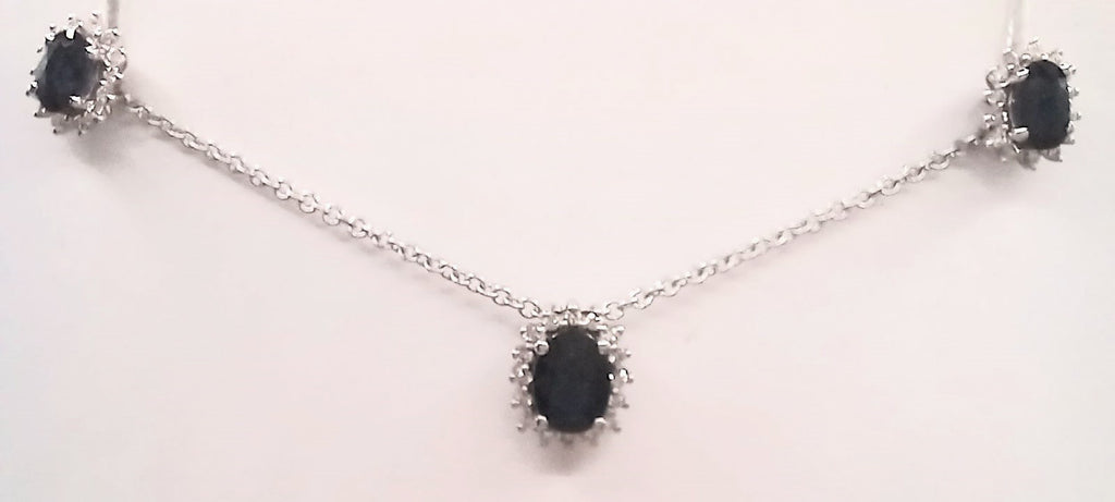 9 ct White Gold Oval cut sapphire and diamond necklace and earrings