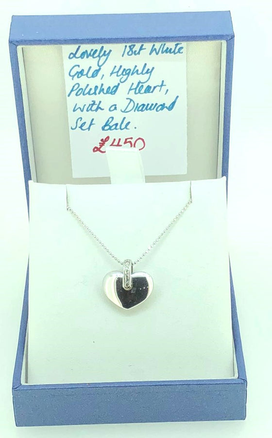 18 ct White Gold and diamond polished heart pendant