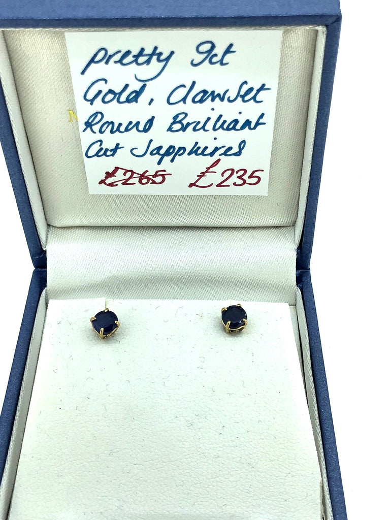 9 ct Yellow Gold earrings with claw set sapphires