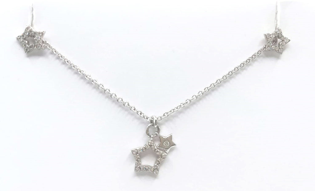 9 ct White Gold twinking stars diamond earrings and necklace