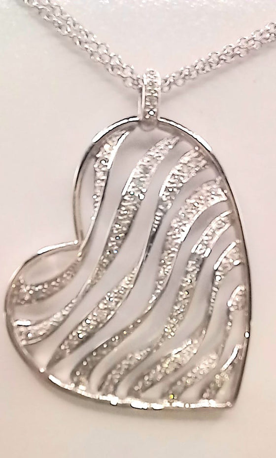 18 ct White Gold pavi set Diamond heart shaped pendant