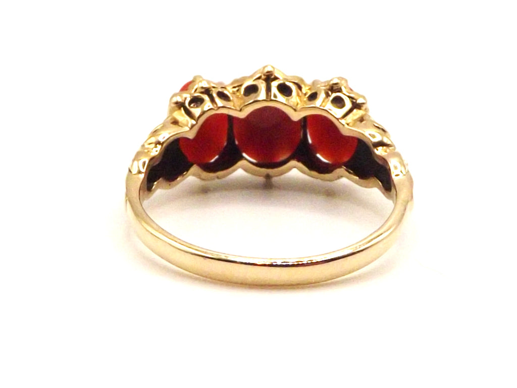 9 ct Yellow Gold trilogy coral ring