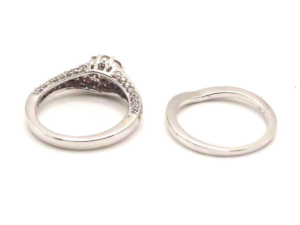 18 ct White Gold comprising of 2 rings with 1 ct of diamonds