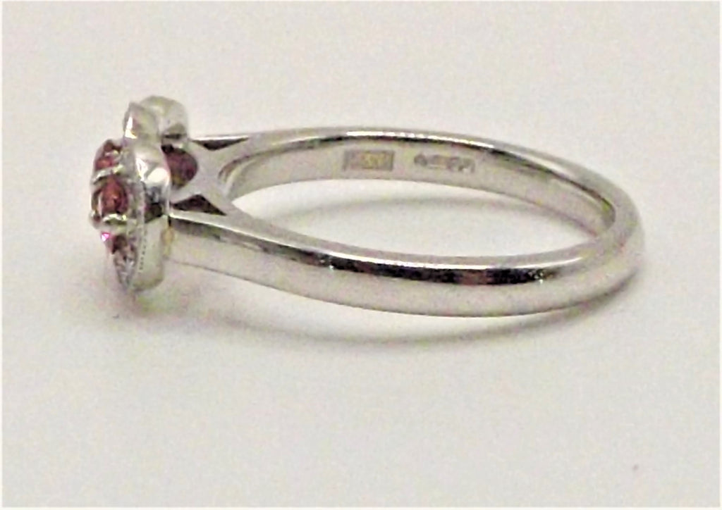 Platinum ring set with pink Spinels & Diamonds