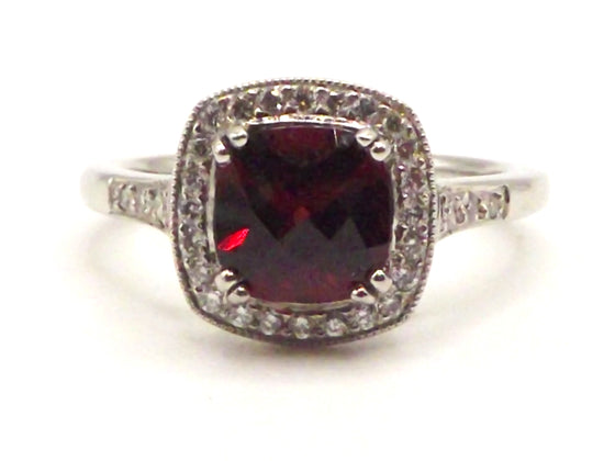 Platinum ring with a 1.68 ct Garnet and 0.22 ct Diamonds