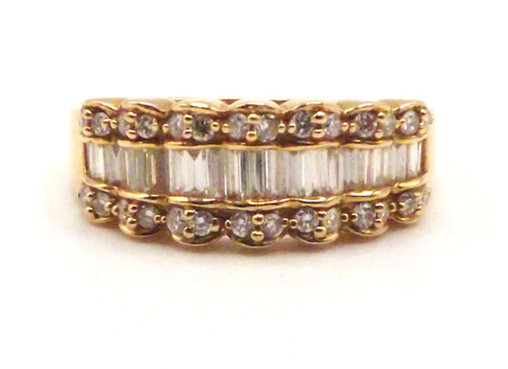 18 ct Yellow Gold ring with 0.76 ct baguette cut diamonds
