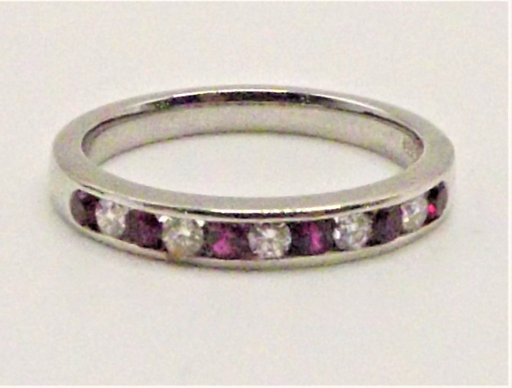 Platinum half eternity ring with rubies and diamonds