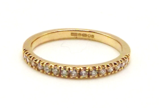 18 ct Yellow Gold ring with 0.22 ct set of round cut diamonds