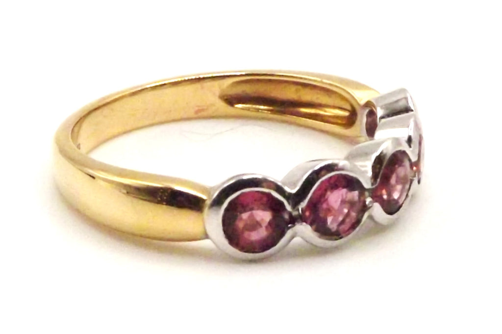 18 ct Gold ring with a set of pink touramalines