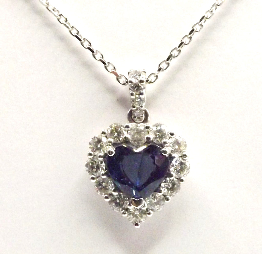 18ct White Gold set with 1.48ct Heart Sapphire and 0.69ct Diamonds
