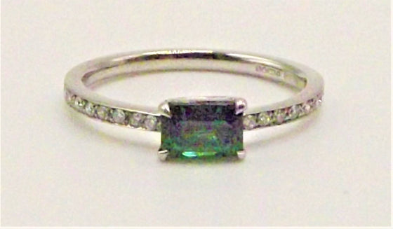 Platinum ring set with 0.47 ct Green Spinel and Diamond Shoulder