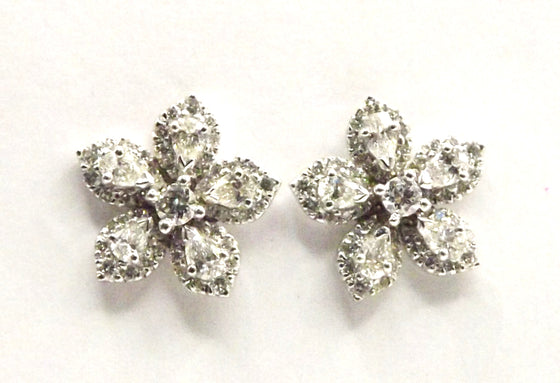 Platinum flower pattern earrings set with 1.17 ct Diamonds